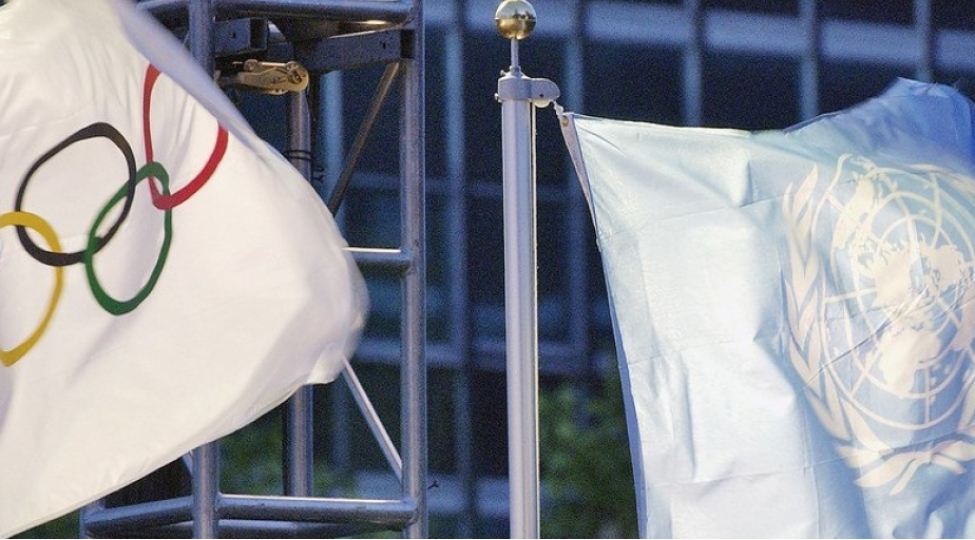 annalena-berbok-munaqishe-tereflerini-olimpiya-ateshkesine-chagirib