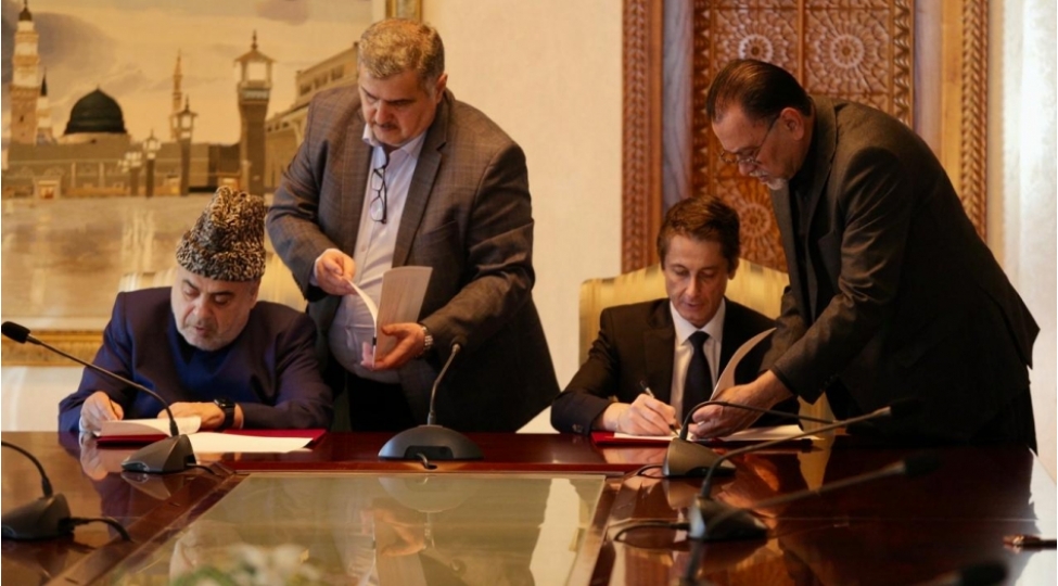 qmi-ile-nizami-gencevi-beynelxalq-merkezi-arasinda-anlashma-memorandumu-imzalanib